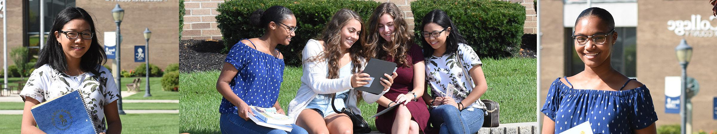 Students looking at an iPad on campus